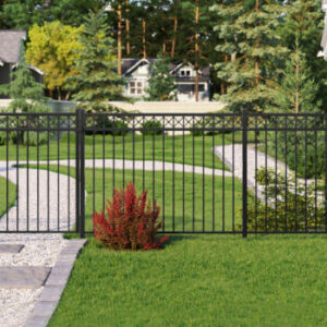 Aluminum Fences Kent County MD Black aluminum fence in front of a large home with many trees surrounding and lush grass